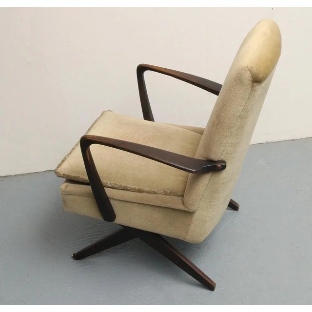 Original 50s armchair. Ingenious folding mechanism of the legs allows to vary the height from armchair height to chair...