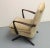 Original 50s armchair. Ingenious folding mechanism of the legs allows to vary the height from armchair height to chair...