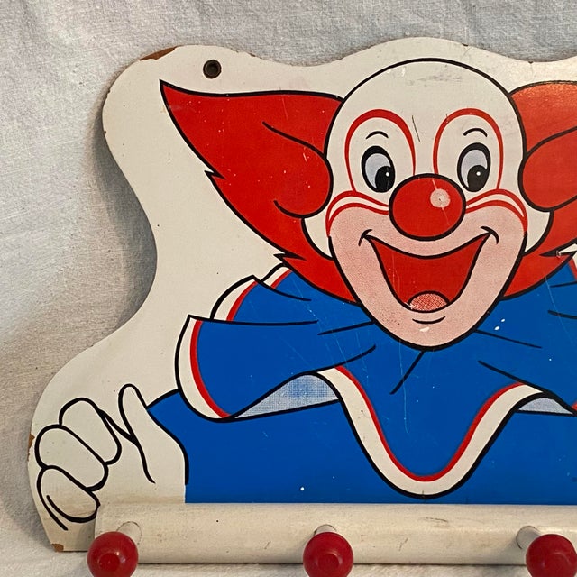 Very rare 1960s Larry Harmon Picture Corporation child’s coat rack. This Bozo The Clown coat rack has 4 pine knob’s to...