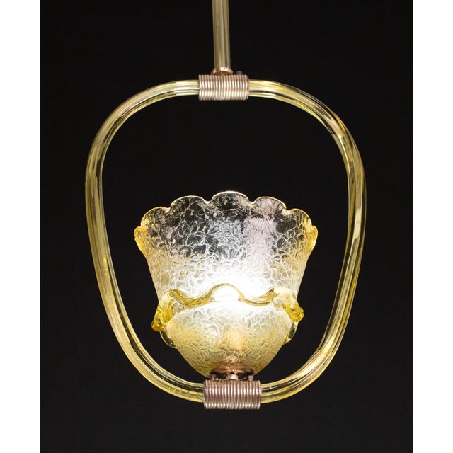 Stunning Murano chandelier extremely rare for its unique amber color. The chandelier is certainly attributed to the...