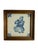 Set of four vintage hand-painted Tichelaar Makkum tiles, each set in a wooden frame. The tiles show traditional Dutch...
