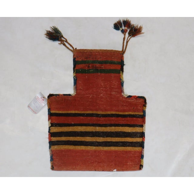 An early 20th century Persian Kurd Saltbag Textile Rug. 17'' x 20'' x 8''