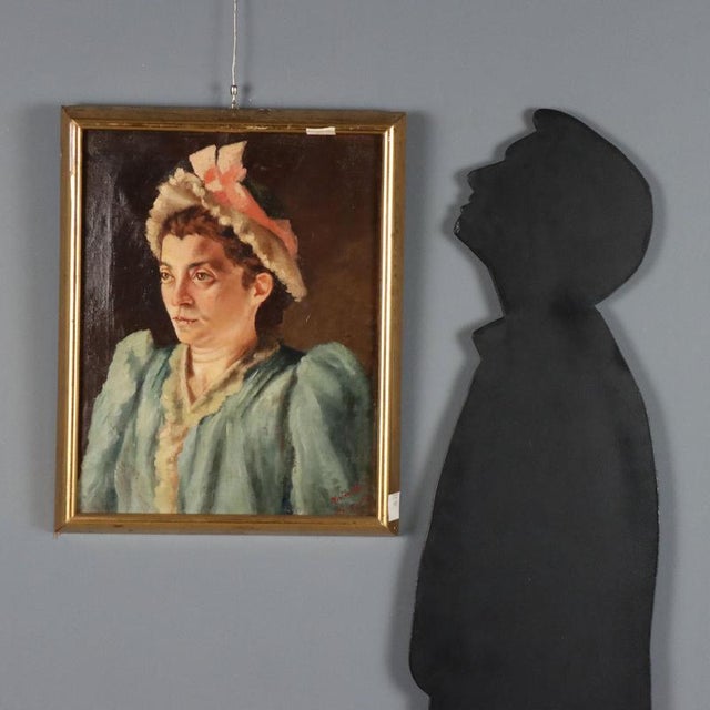 Oil on canvas. Unidentified signature and date 1892 on the lower right. Portrait of a stern, middle-aged woman, composed...