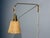 Ateljé Lyktan, Swedish Mid-Century Modern, Articulating Wall Light or Sconce, Brass, Cane, Teak, Sweden, 1970s A brass,...