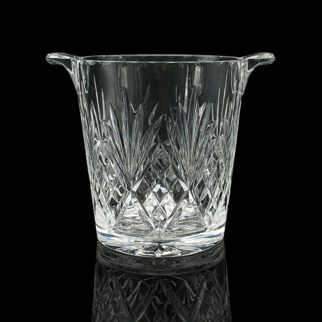 This is a vintage wine cooler. An English, cut glass ice bucket, dating to the mid 20th century, circa 1960. Appealing cut...