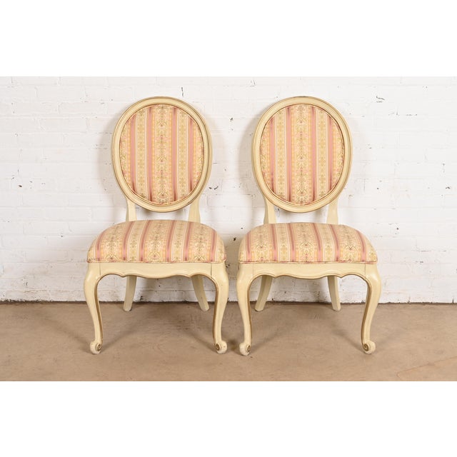 A gorgeous pair of French Provincial Louis XV style dining chairs By Karges Furniture USA, Circa 1960s Beautiful carved...
