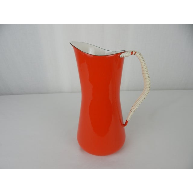 1950s Kobenstyle Pitcher as designed by Jens Quistgaard for Dansk. Enamelware with original cord wrapped handle. Excellent...