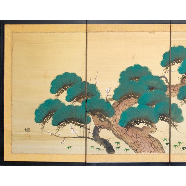 Beautiful vintage Japanese painted 4-panel Silk Byobu (folding screen) depicts an Evergreen Pine Tree. Signed and sealed...