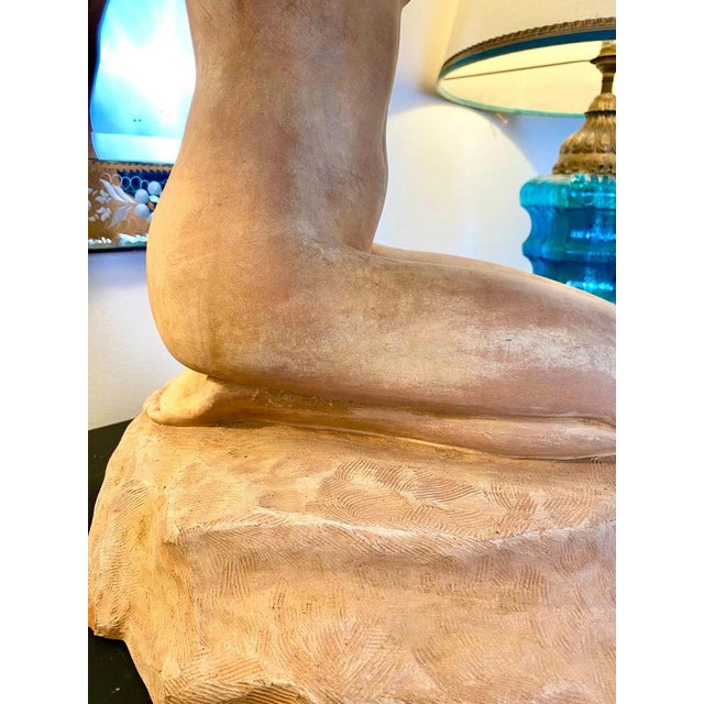 Female nude in terracotta. Signed "St. Lami" on the base. Stanislas Lami is a French sculptor. Stamp mark "Terracotta - R....