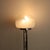 This refined floor lamp is an emblematic example of 1970s Italian Space Age design. Characterized by a sleek, futuristic...