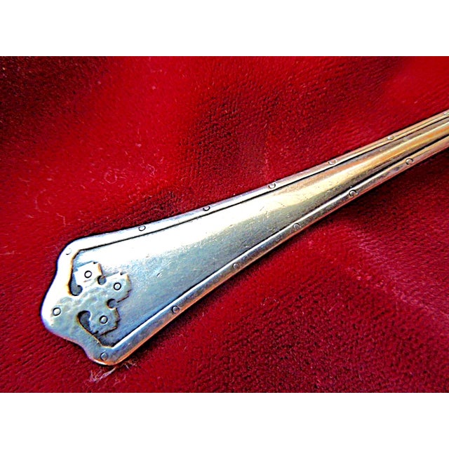 Offered is a very rare baby's ice cream spoon in Wallace's 1912 arts & crafts style 'Carmel' pattern. It is 4 3/8" in...