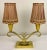 Stunning pair of original antique Art Deco table lamps attributed to Jules Leleu. Based on the Neoclassical form, the...