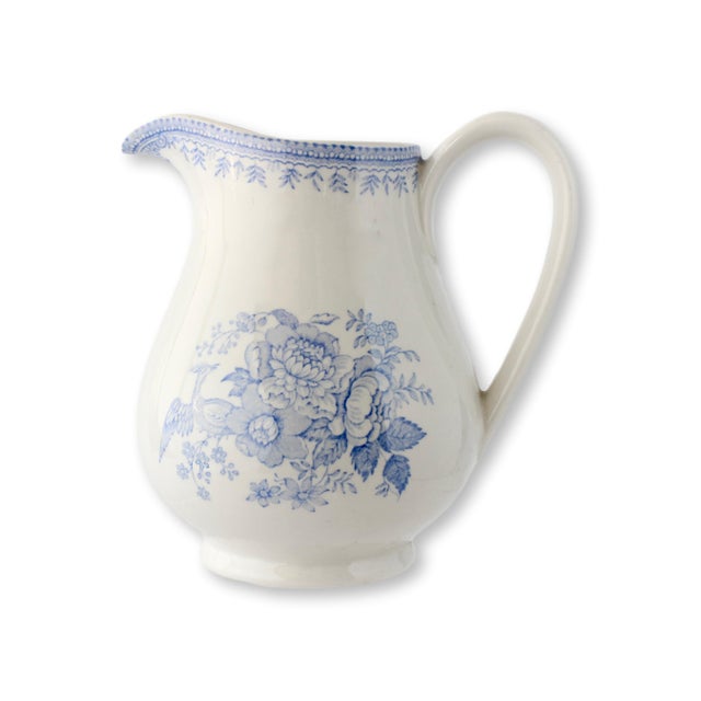 Midcentury Burleigh pitcher in the classic Asiatic Pheasant pattern, decorated in soft blue transferware on a white...