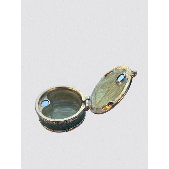 This beautiful green pill box / trinket box features a charming elephant design on the lid, making it both meaningful and...