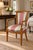 This distinctive armchair by William Switzer interprets French Empire design with an elegant, sculptural profile. Its...