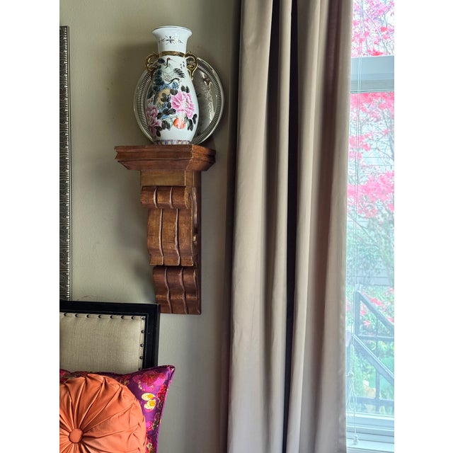 Here is a substantial size hand carved wood wall sconce or corbel. It is intentionally distressed, stained and brushed on...