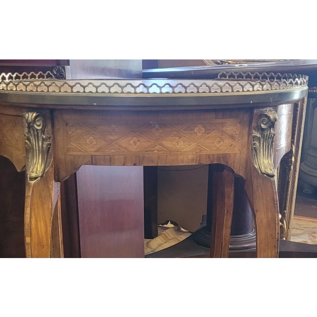 Super antique early 20th century stone top inlaid French occasional table. Features a side drawer and a pull out leather...