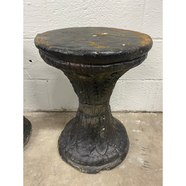 Elevate your garden or sunroom with this dramatic pair of vintage cast stone garden stools, rescued from a historic estate...