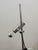 Beautiful table lamp by Staff Leuchten. Germany, 1970s. Matte black lacquered metal base. The arm supporting the reflector...