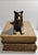 For your consideration . . . A vintage bronze sculpture design of a wolf lying on the top of a faux leather book. The...