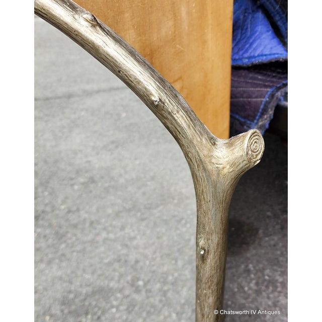 This is a really good vintage pewter finished hanging wall mirror designed by Carol Conner and sold through the Carver's...