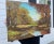 This autumn scened depicted in oil paint on canvas is brightly colored with chartreuse, bright orange and terra cotta...