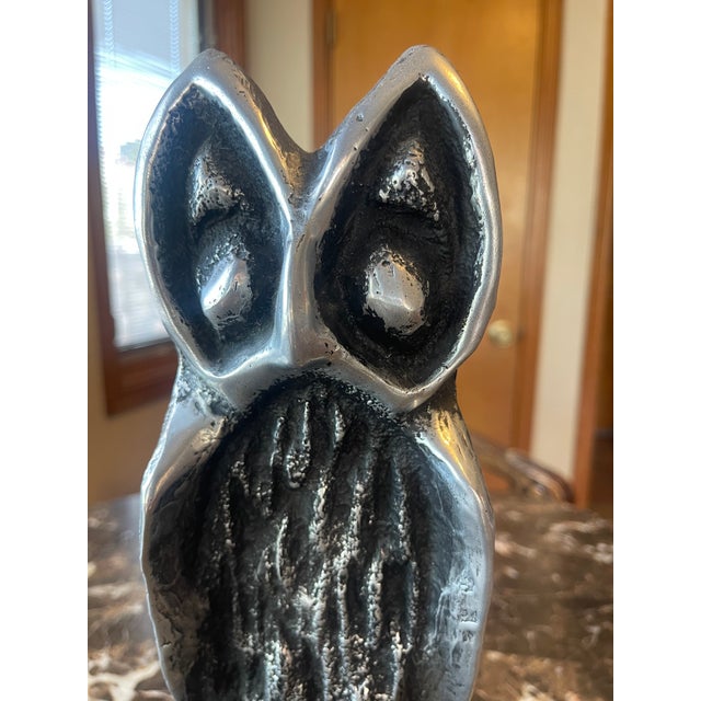 Pewter Sculpture of Abstract Owl. Round base is 7 inches long and 2 inches tall.