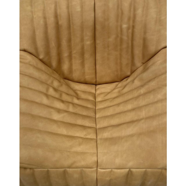 This Sandra Chair has been reupholstered with parts of new foam and leather. The bottom could show some signs of use. This...