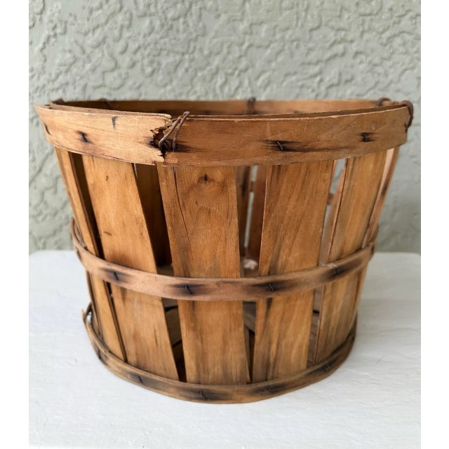 Vintage bushel produce basket. Rustic in appearance. Great for fall/harvest decorating.