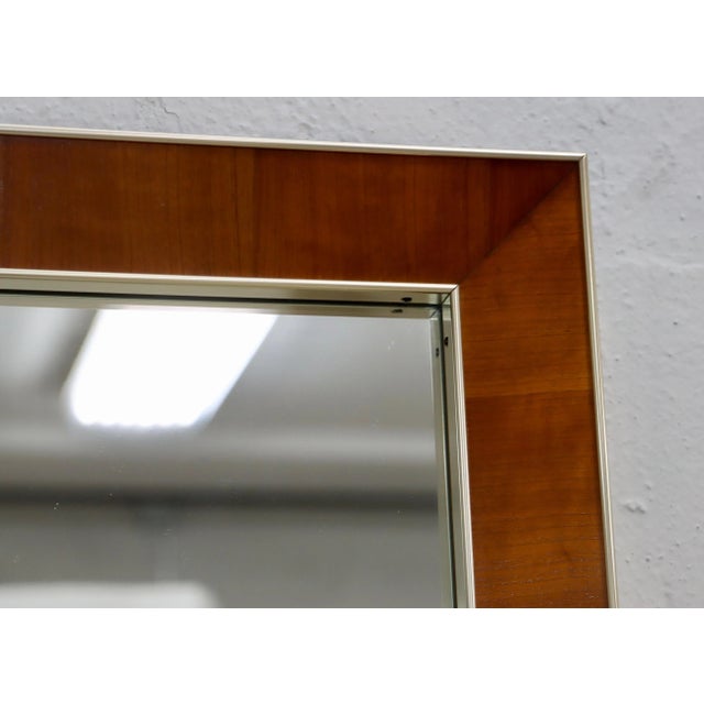 1960's mid-century modern brass plated and walnut well made and heavy wall mirror by John Stuart Inc made by John...