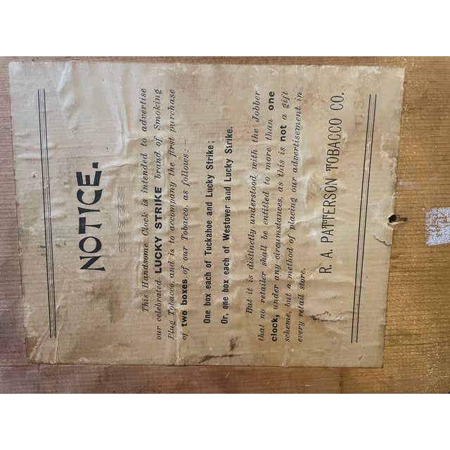 An exceptionally rare piece of early American tobacco history. This authentic octagonal wood regulator wall clock was...