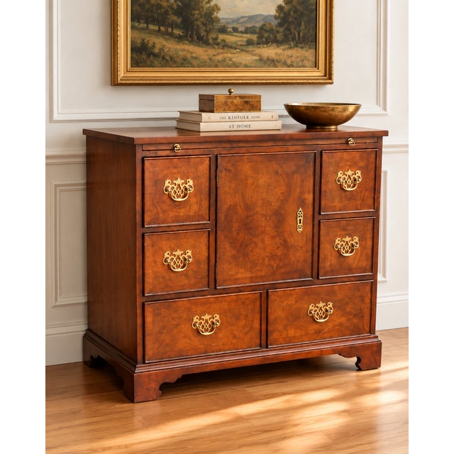 Handsome vintage gentleman’s chest by Kindel Furniture of Grand Rapids, crafted in beautifully figured wood with warm burl...