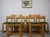 Set of six modernist chairs with a graphic and geometric square-section structure, sled base, sculpted backrest that...