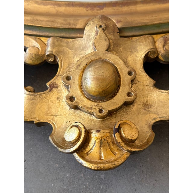 French Provincial French 19th Century Vertical Gold Gilt Mirror with Floral crest For Sale - Image 3 of 18