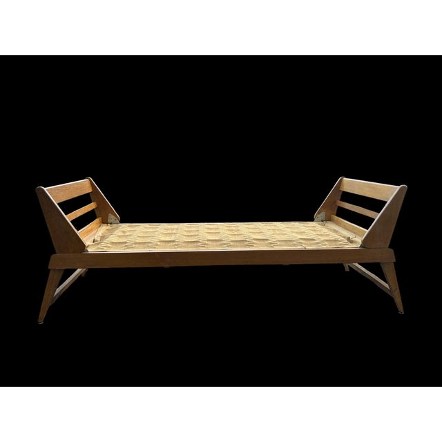 French oak chaise longue from the 1950s, designed by René Jean Caillette, in original condition. Modernist design by a...