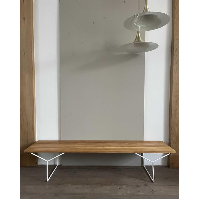 This bench originally had white slats, but was in poor condition with some crackle. Restored to this version. Some...