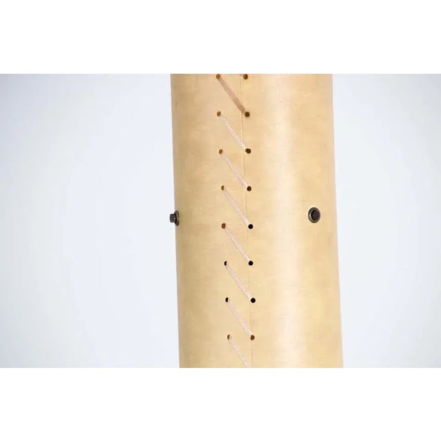 Pendant lamp in the style of Gabriel Ordeig Cole for Santa and Cole The Lampshade is made of stitched beige parchment with...