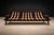 A sculptural three-seat sofa designed by Jean Gillon in the 1970s, executed in solid Brazilian rosewood (jacarandá) and...