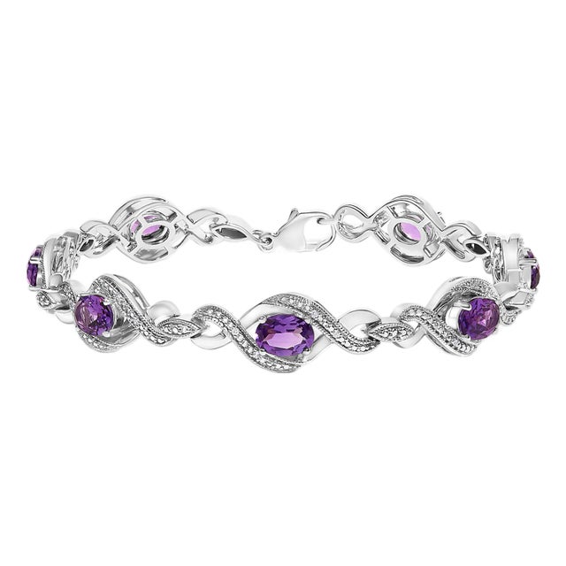 .925 Sterling Silver 1/10 Cttw Natural Round Diamond and 7X5MM Oval Amethyst Cross Tennis Bracelet For Sale
