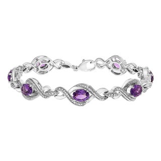 .925 Sterling Silver 1/10 Cttw Natural Round Diamond and 7X5MM Oval Amethyst Cross Tennis Bracelet (I-J Color, I1-I2 Clarity) - 7" For Sale