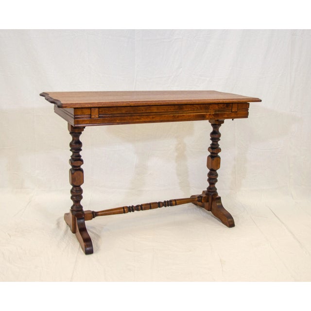 This vintage mahogany table can be used behind a sofa, as a console table, and as a breakfast table with the hidden...