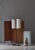 A pair of large Danish Modern floor lamps in patinated brass and acrylic shades. The lamps were made in the 1960s as part...