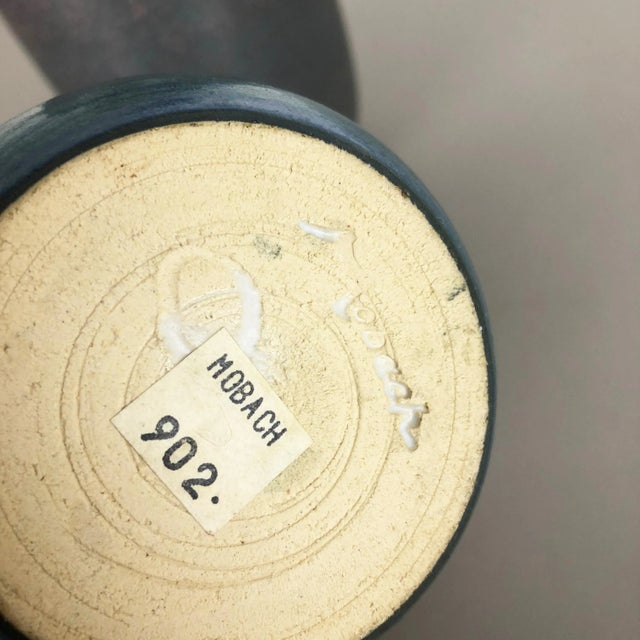 This set of 2 original vintage studio pottery vases was designed in the 1970s by Piet Knepper for Mobach in Utrecht,...