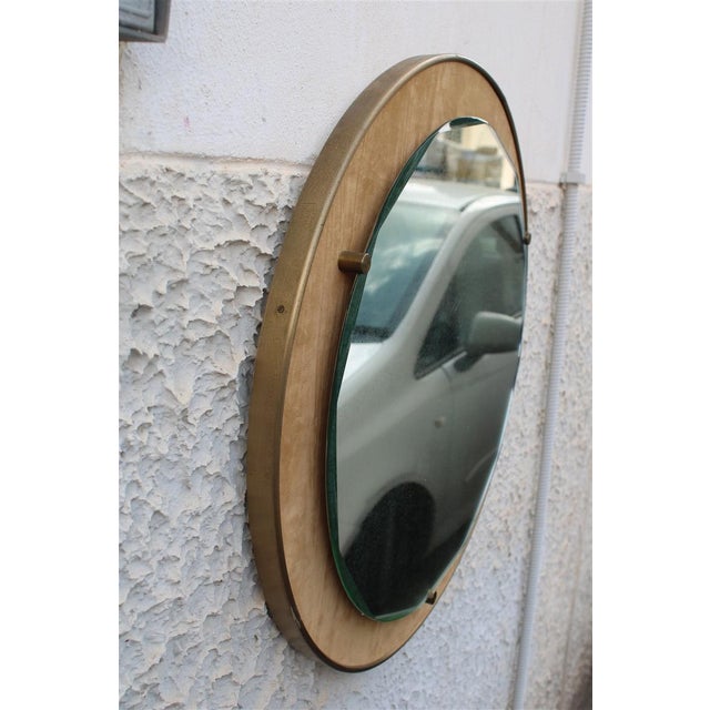 Italian Round Mirror by Santambrogio & De Berti, 1950, in Very Good conditions. Designed 1950 to 1959 This piece is...