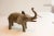 :: Vintage handmade African elephant sculpture. Circa late mid 20th century, though possibly older, this piece has such...