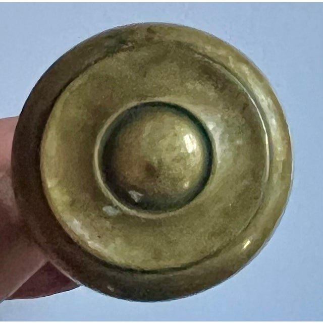 Pair antique 19th century small scale brass door knobs. Neoclassical taste with concentric circle design. Each pair...