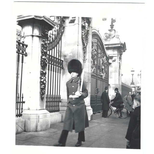 1950s photograph of the Queen's Guard marching outside the gates of Buckingham Palace. Unmarked. Combined shipping...
