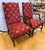 A stunning pair of Ethan Allen armchairs feature solid mahogany frames with a graceful curved arm profile and square...