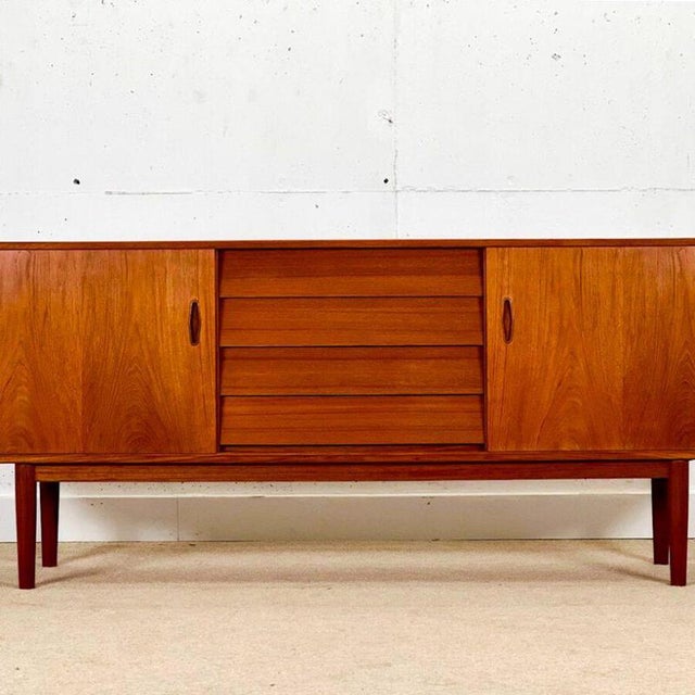 A beautiful Mid-Century Modern sideboard , designed by Nils Jonsson and expertly handcrafted by Troeds in Sweden during...
