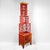 This extraordinary vintage etagere cabinet serves as a masterclass in Chinoiserie elegance and Hollywood Regency flair....
